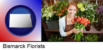 pretty florist holding a bunch of tulips in Bismarck, ND