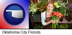 Oklahoma City, Oklahoma - pretty florist holding a bunch of tulips