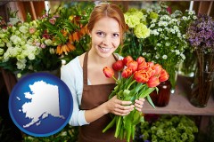 alaska map icon and pretty florist holding a bunch of tulips