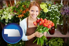 nebraska map icon and pretty florist holding a bunch of tulips