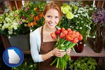pretty florist holding a bunch of tulips - with Georgia icon