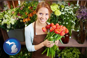 pretty florist holding a bunch of tulips - with Michigan icon