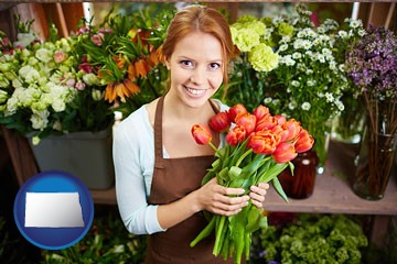 pretty florist holding a bunch of tulips - with North Dakota icon