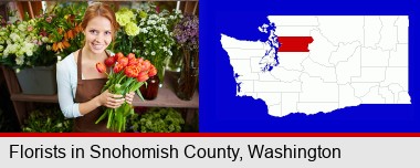 pretty florist holding a bunch of tulips; Snohomish County highlighted in red on a map