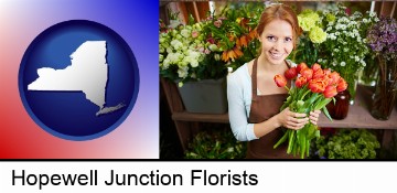 pretty florist holding a bunch of tulips in Hopewell Junction, NY