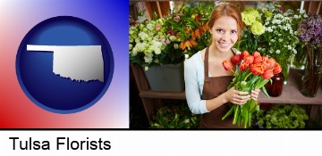 pretty florist holding a bunch of tulips in Tulsa, OK