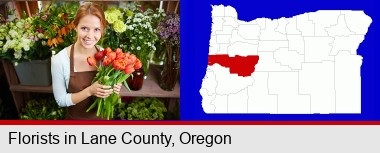 pretty florist holding a bunch of tulips; Lane County highlighted in red on a map